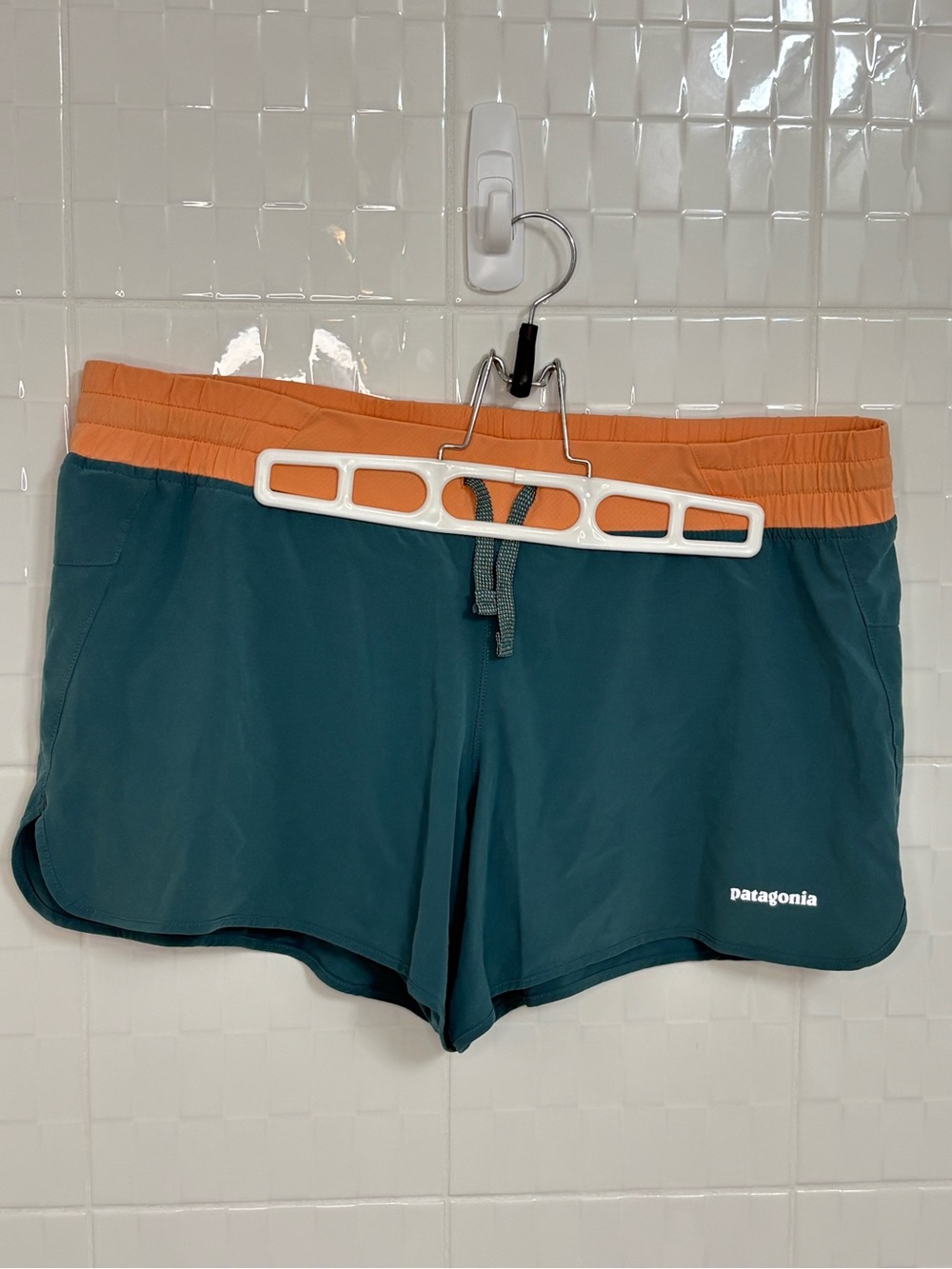 Women’s Patagonia Teal Athletic Shorts with Orange Waistband - size L